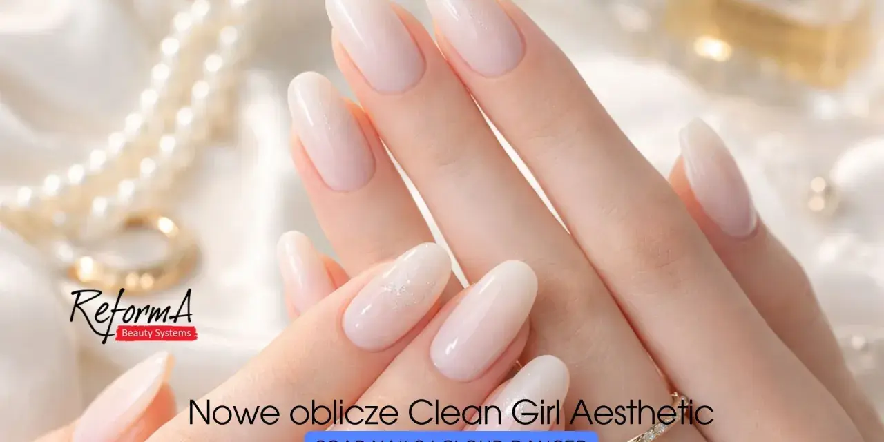 Delikatne, mleczne paznokcie w stylu clean girl, ozdobione subtelnym brokatem. Idealne dla każdej kobiety ceniącej elegancję.